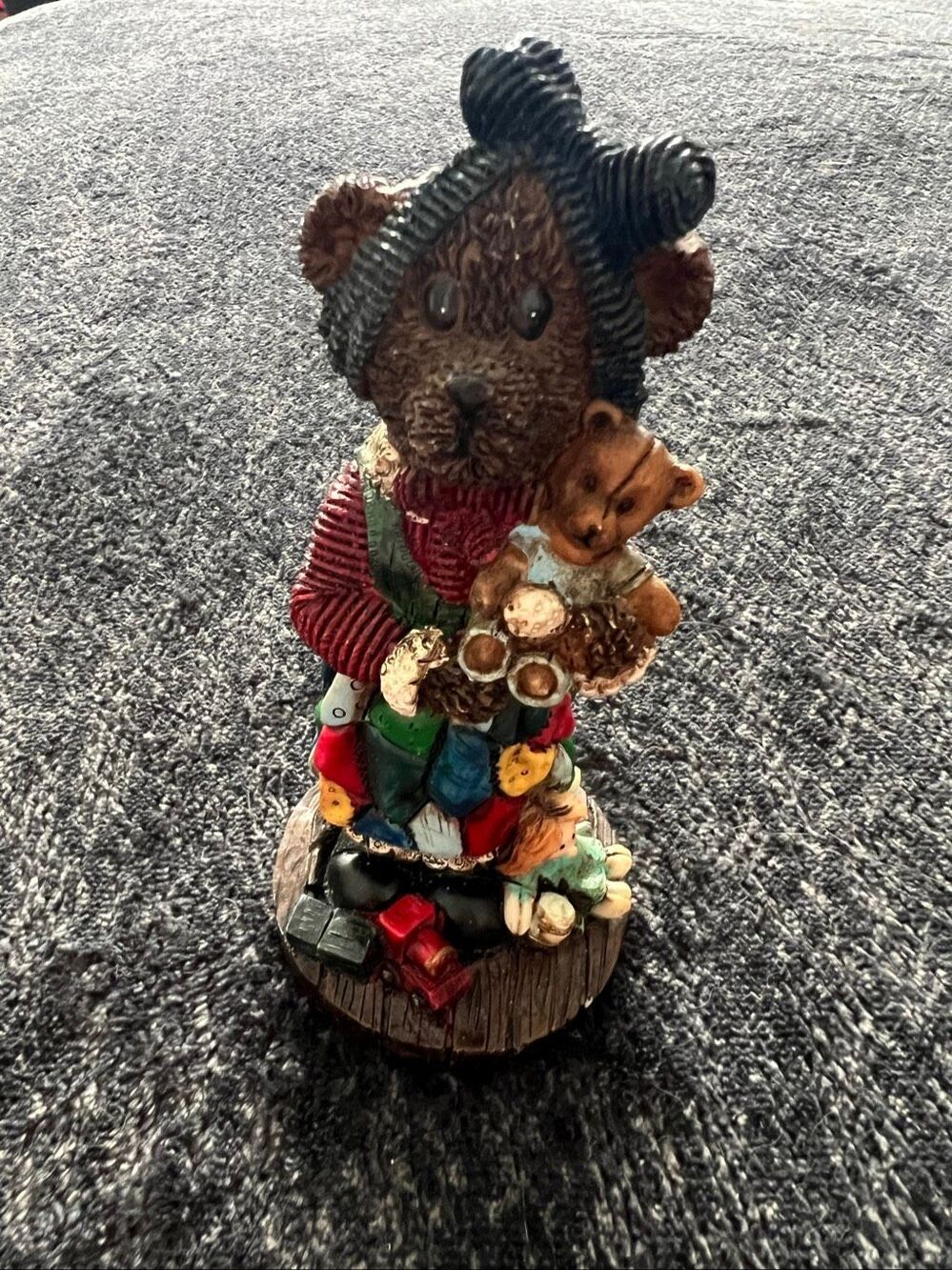 Bear Figurine Holding Teddy Bear
